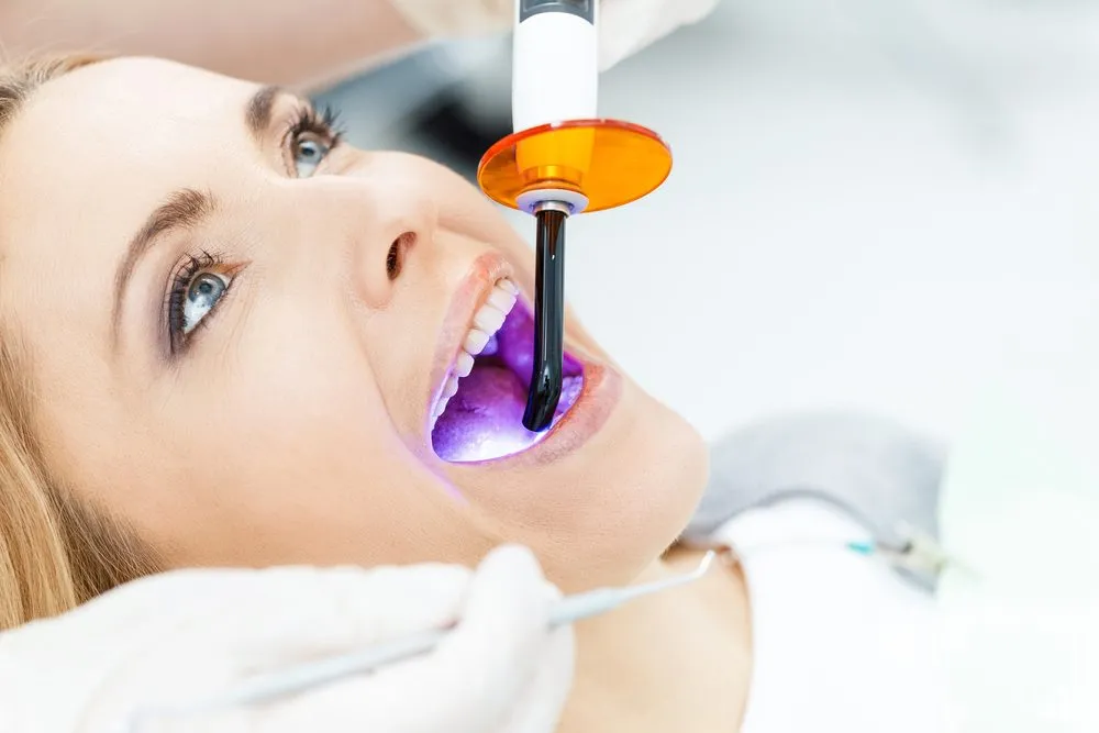 30287 cosmetic dentist examining teeth